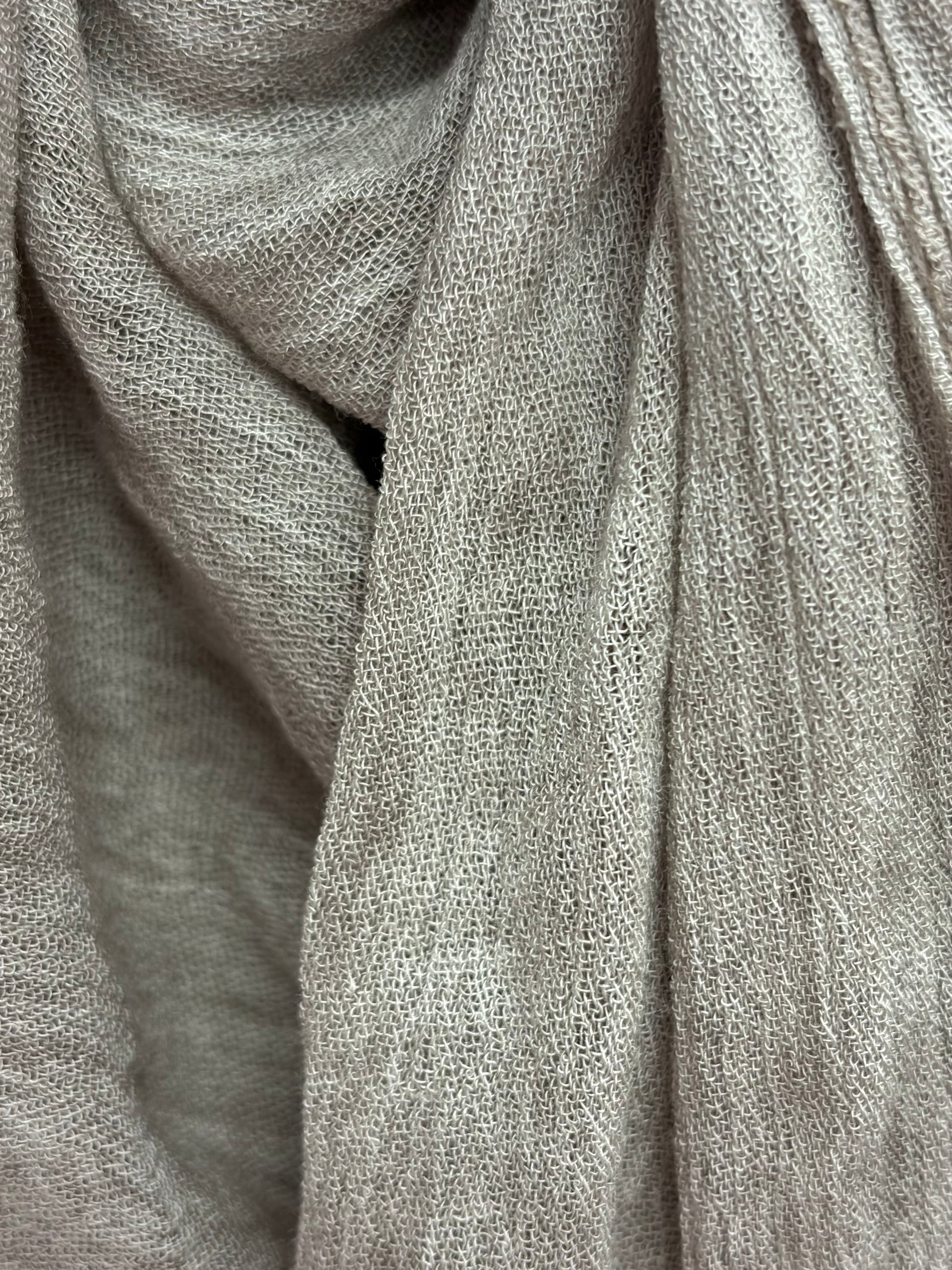 crinkle hijab texture close up light neutral fabric